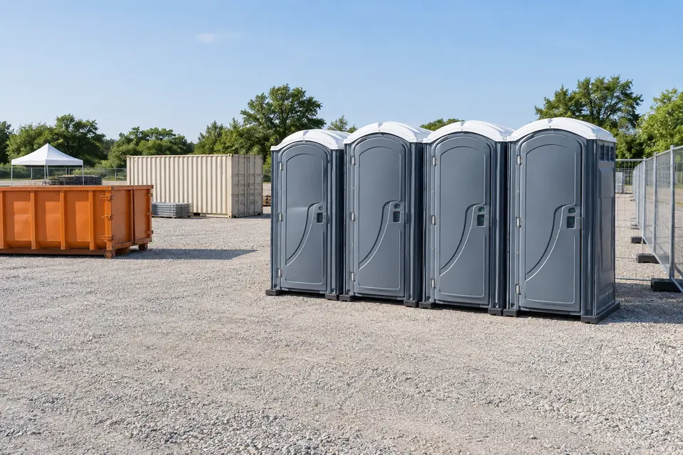 Portable toilet lineup at a prepared outdoor work area